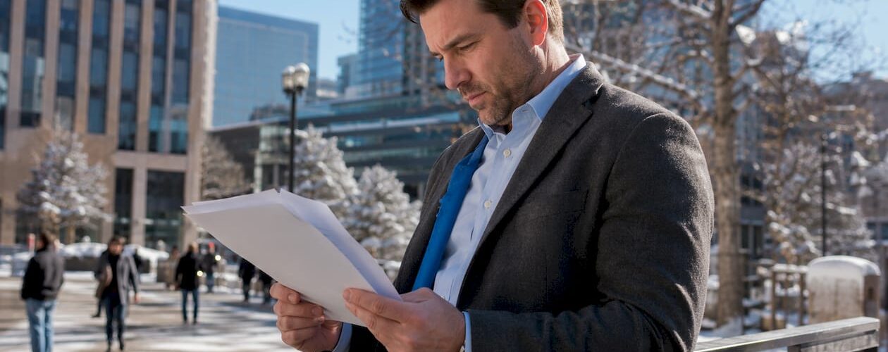Property manager reviewing snow removal contracts