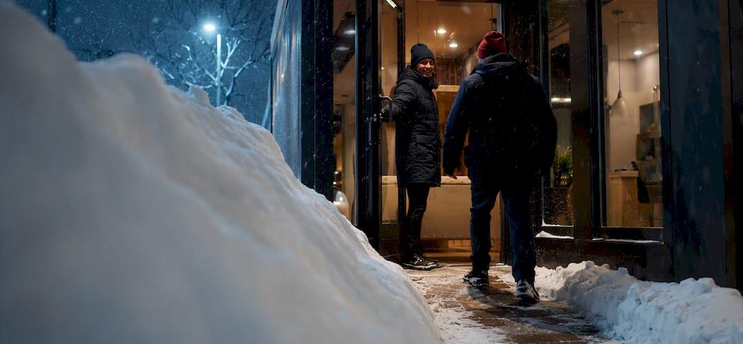 Small business entrance during heavy snowfall