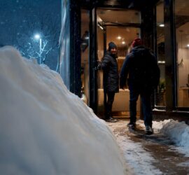 Small business entrance during heavy snowfall