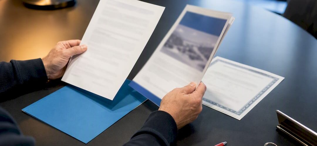 Board member reviewing snow removal contract documents