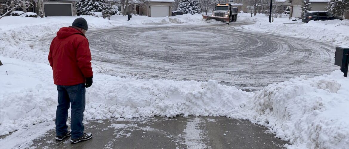 Snow berms blocking cul-de-sac driveway aprons